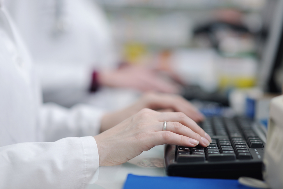 Pharmacist working on computer