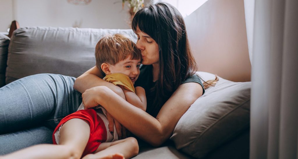 Mother Cuddling child