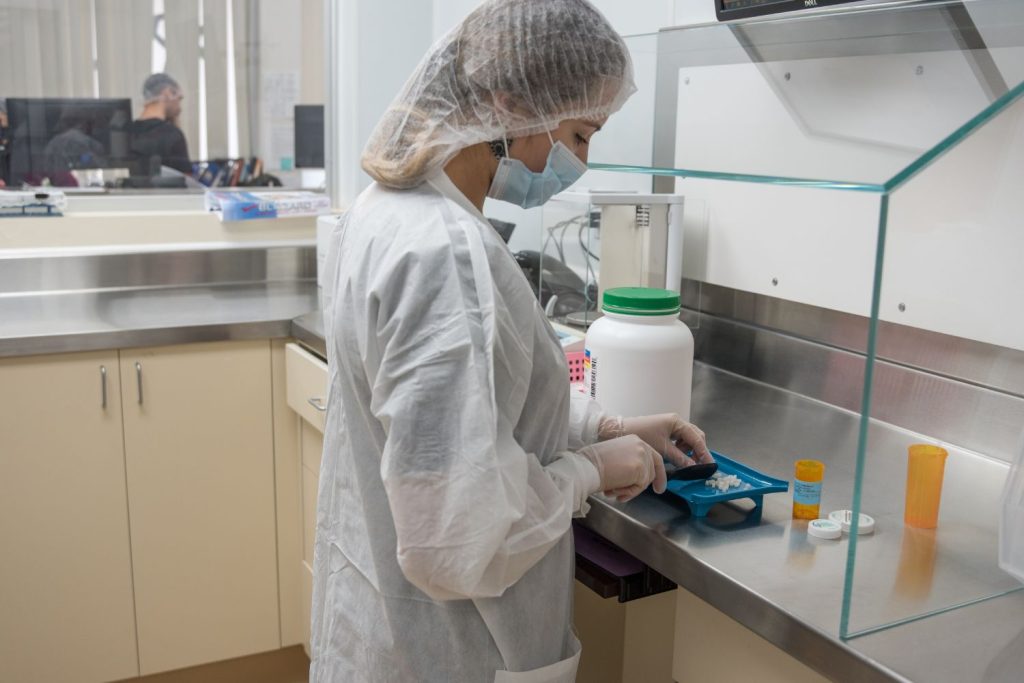 Person doing specialty compounding in room